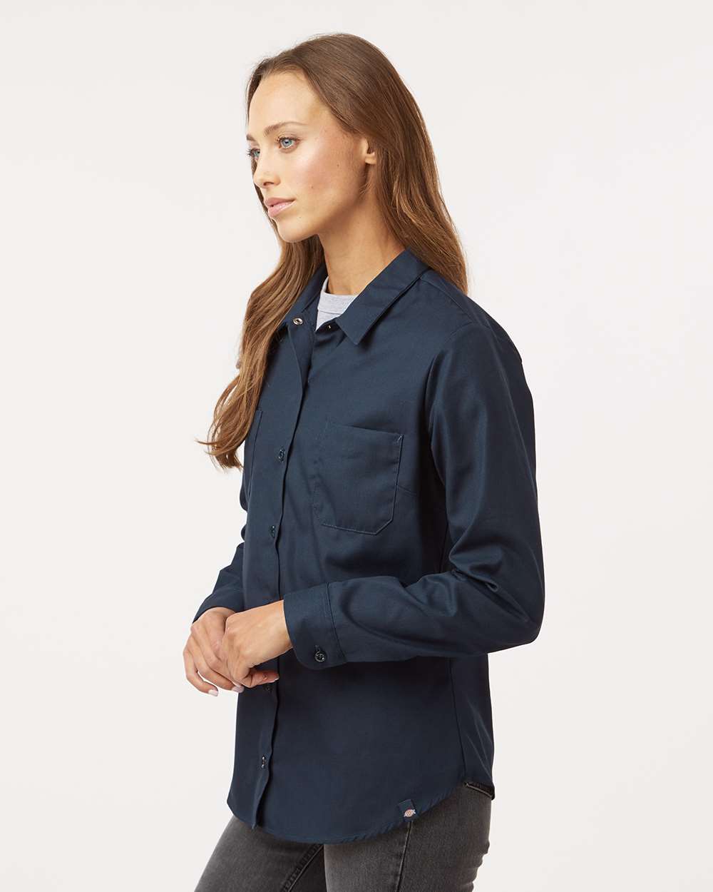 Woman wearing a navy blue shirt on a white background, Dickie's Women's Industrial Long Sleeve Work Shirt, Embroidered