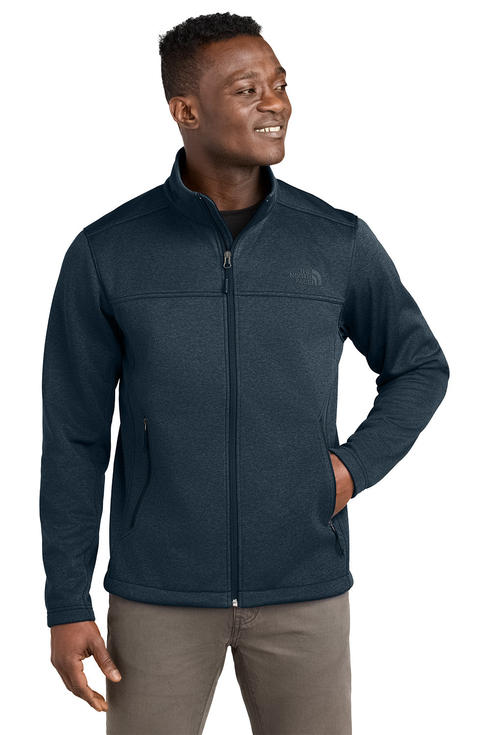 Man wearing a dark blue jacket on a white background embroidered The North Face® Chest Logo Ridgewall Soft Shell Jacket