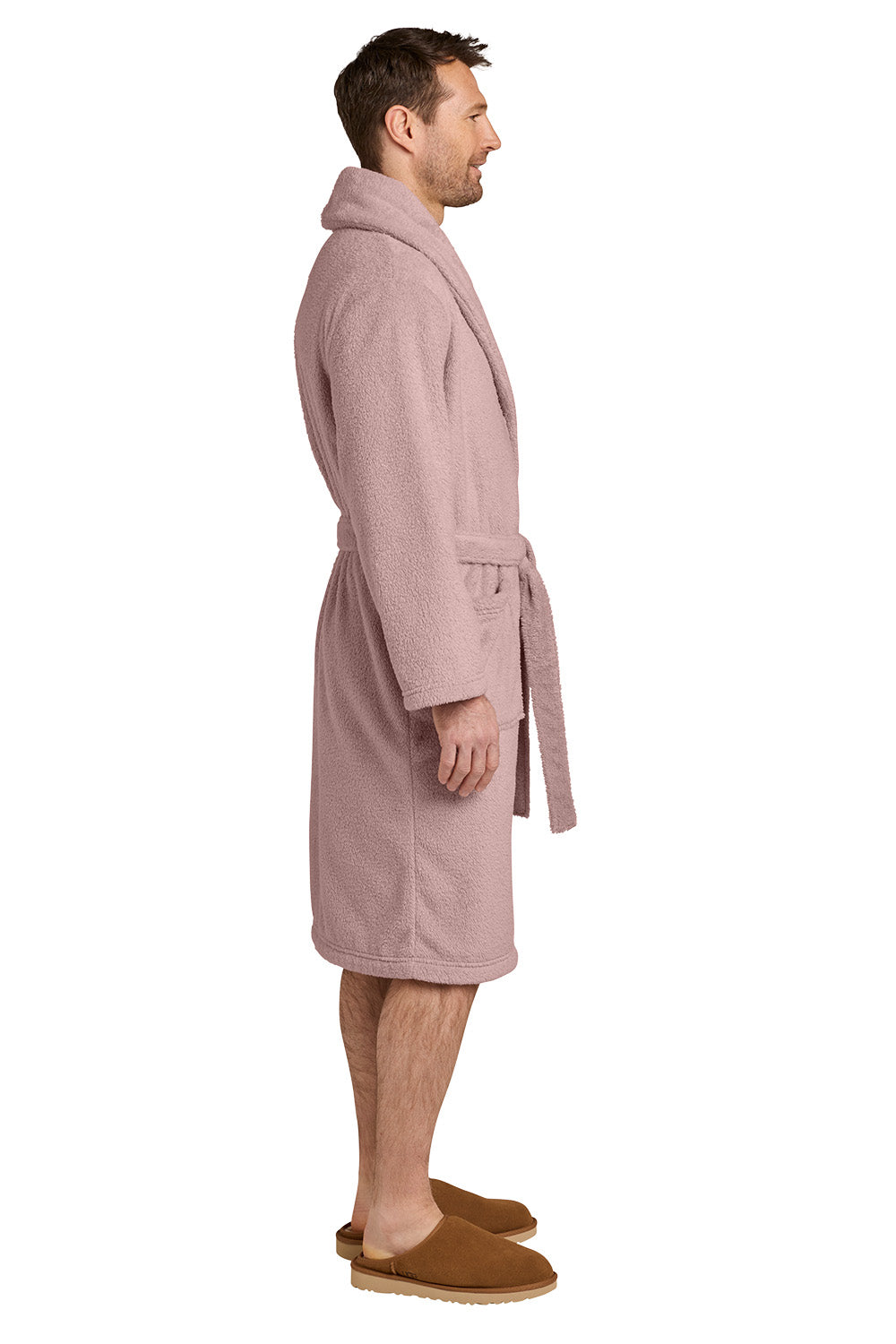A man in profile wearing a dusty pink bathrobe and brown slippers against a plain white background. Port Authority® Dream Plush Robe, Embroidered