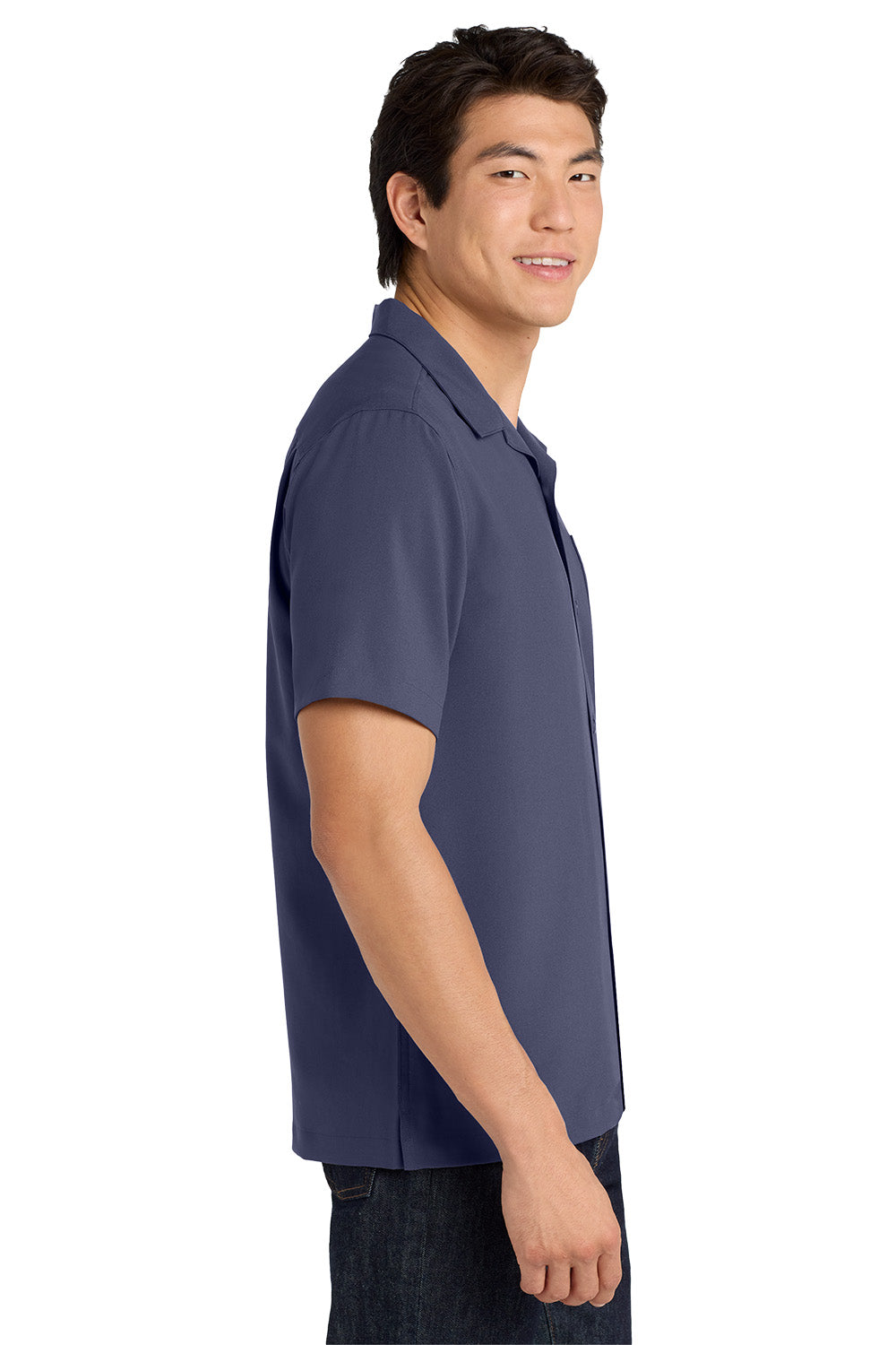 Man wearing a navy blue polo shirt on a white background embroidered Port Authority ® Short Sleeve Performance Staff Shirt