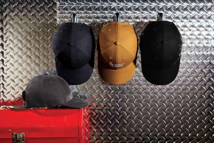 work hats hanging, needing embroidery