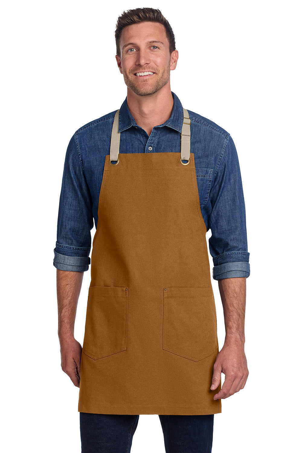 Man wearing a brown apron over a blue shirt on a white background, Port Authority® Canvas Full-Length Two-Pocket Apron, Embroidered