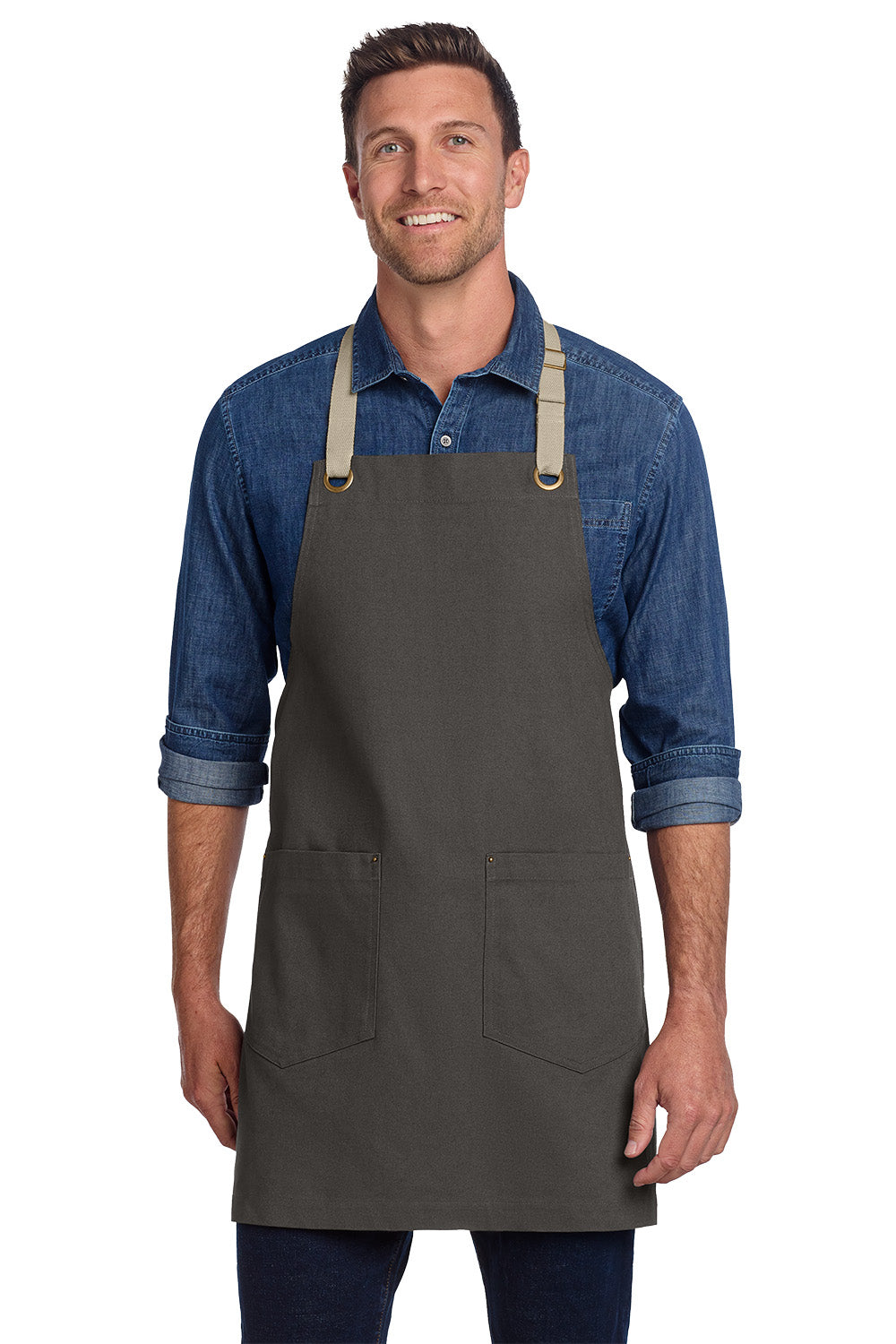 Man wearing a dark gray apron over a blue denim shirt on a white background, Port Authority® Canvas Full-Length Two-Pocket Apron, Embroidered
