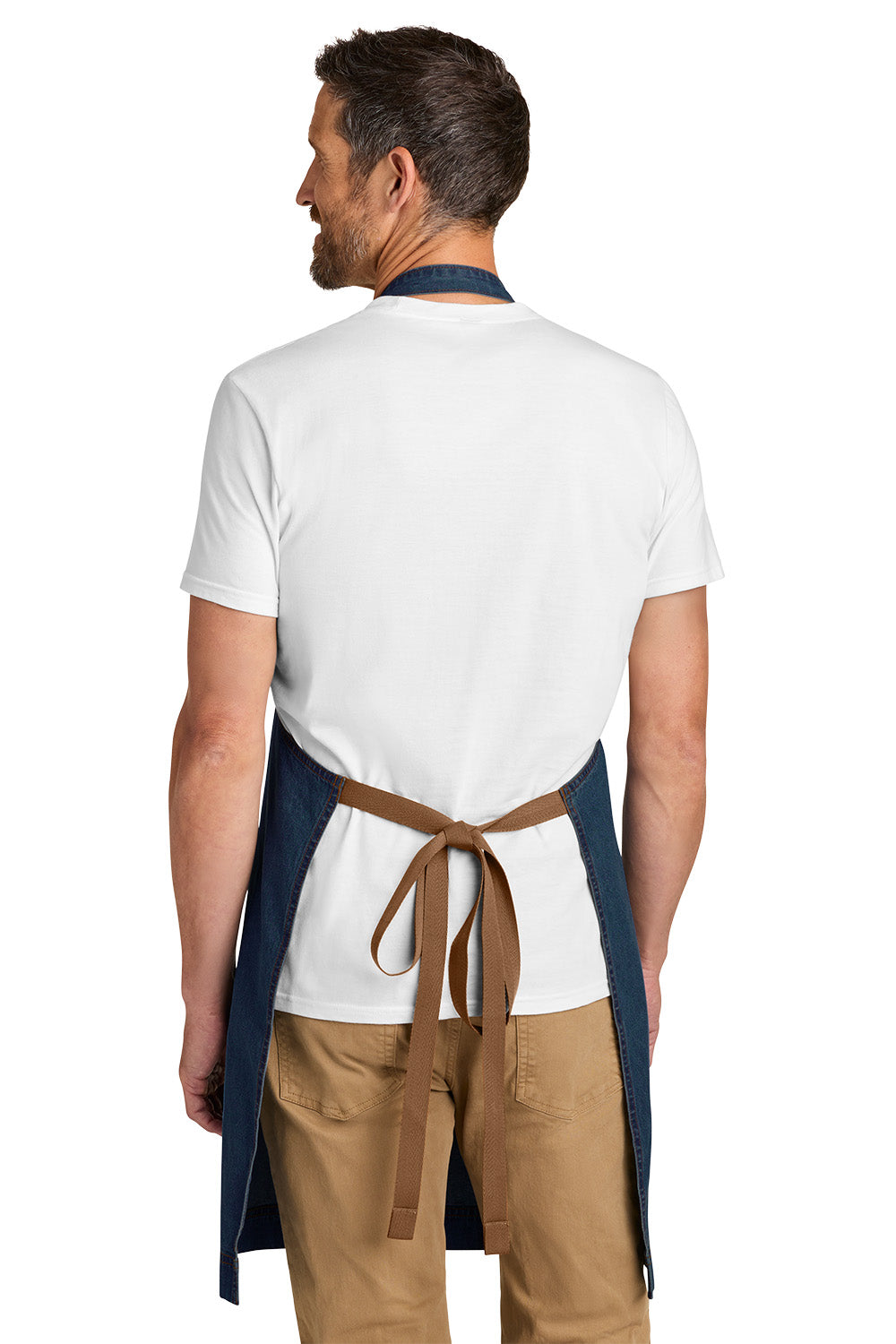 Man wearing a white shirt, navy apron, and brown pants on a white background Port Authority® Signature Denim Apron, Embroidered