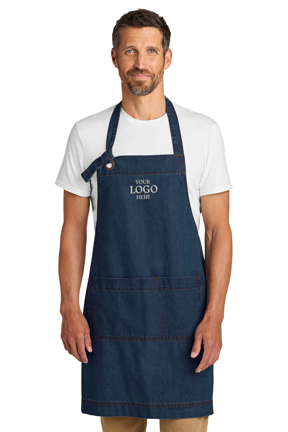 Man wearing a navy blue apron with 'Your Logo Here' text on a white background Port Authority® Signature Denim Apron, Embroidered