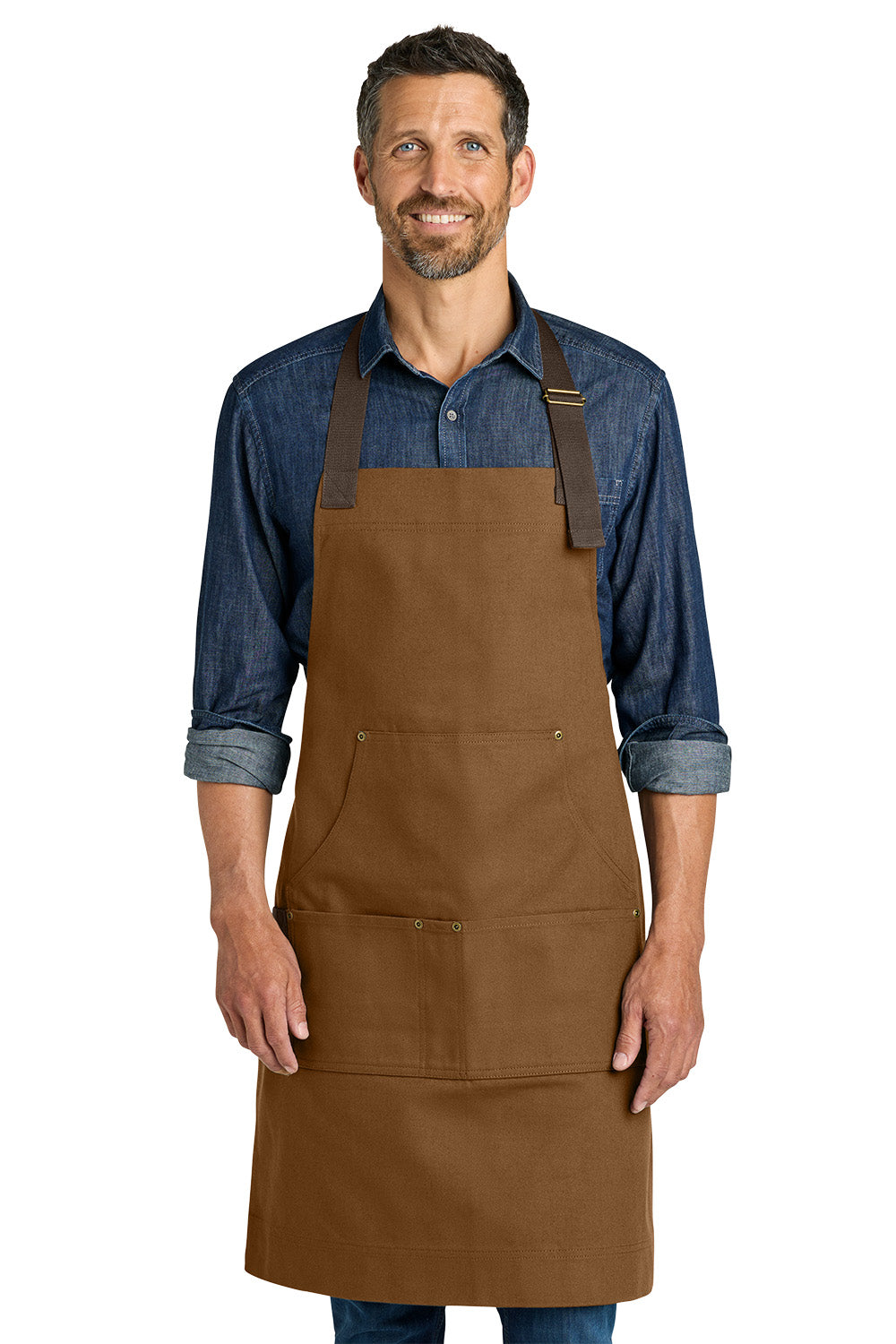Man wearing a brown apron over a blue shirt on a white background Port Authority® Signature Workwear Apron, Embroidered