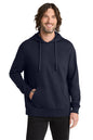 Man wearing a navy blue hoodie on a white background, Embroidered Allmade® Unisex Organic French Terry Pullover Hoodie