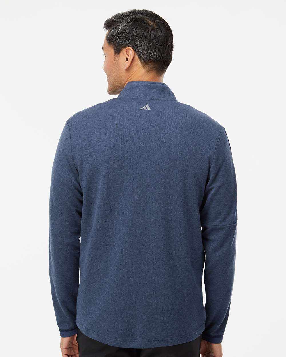 Man wearing a blue Adidas long-sleeve shirt on a white background. Men's 3-Stripes Quarter-Zip Sweater Pullover, Embroidered by Helmsman Stitch Co.
