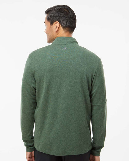 Person wearing a green long-sleeve shirt on a white background. Men's 3-Stripes Quarter-Zip Sweater Pullover, Embroidered by Helmsman Stitch Co.
