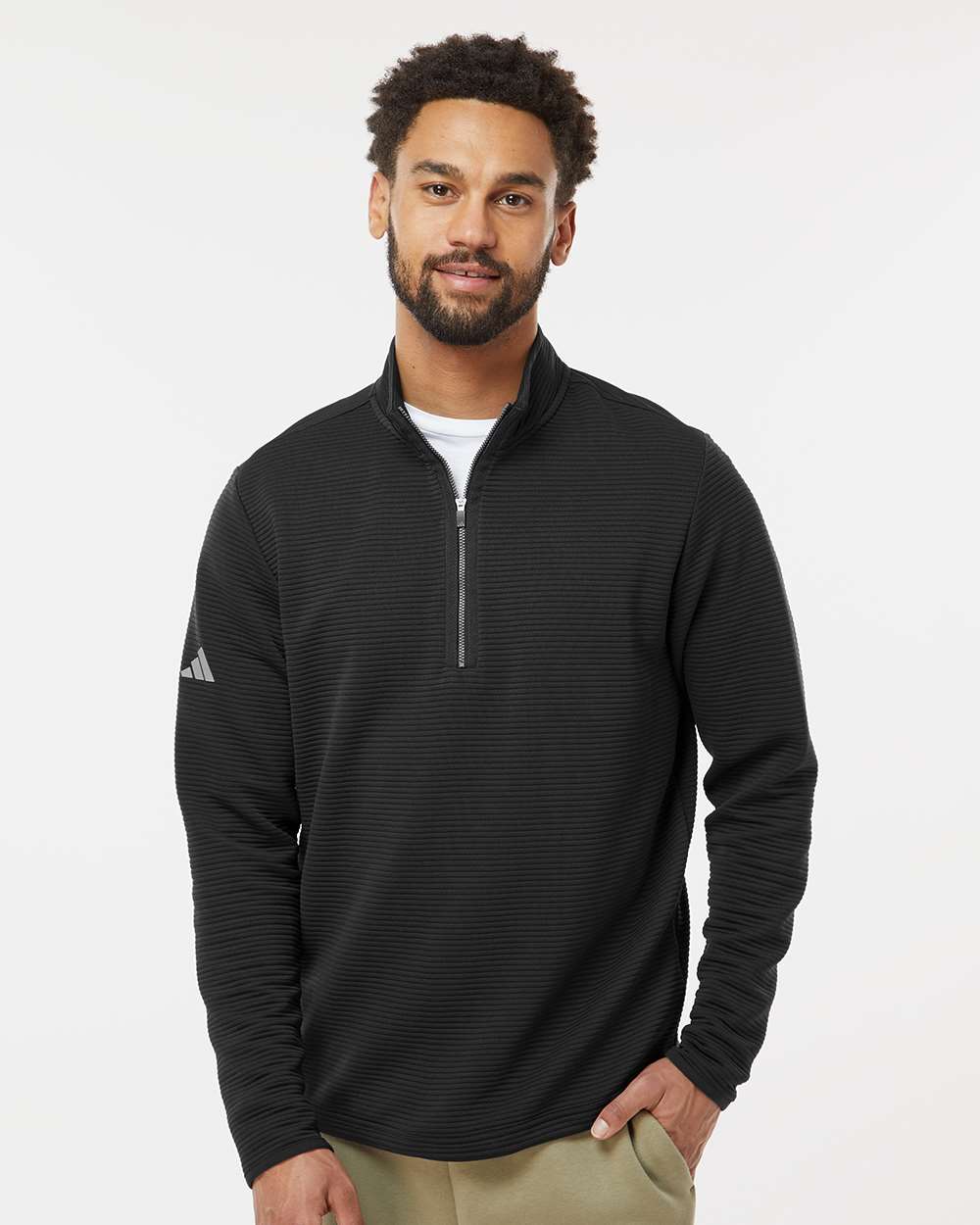 Man wearing a black Adidas quarter-zip pullover against a white background, Adidas Men's Spacer Quarter-Zip Pullover, Embroidered