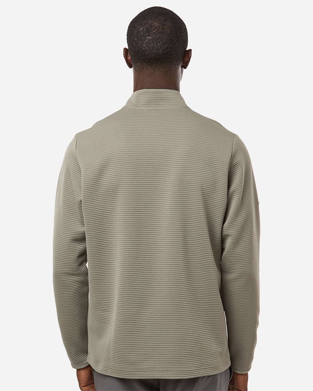 Man wearing a light green textured shirt on a white background. Adidas Men's Spacer Quarter-Zip Pullover, Embroidered by Helmsman Stitch Company