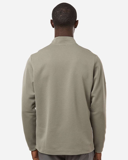 Man wearing a light green textured shirt on a white background. Adidas Men's Spacer Quarter-Zip Pullover, Embroidered by Helmsman Stitch Company