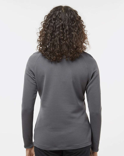 Person wearing a gray long-sleeve shirt with a subtle pattern on a white background. Adidas Women's Spacer Quarter-Zip Pullover, Embroidered by Helmsman Stitch Co.