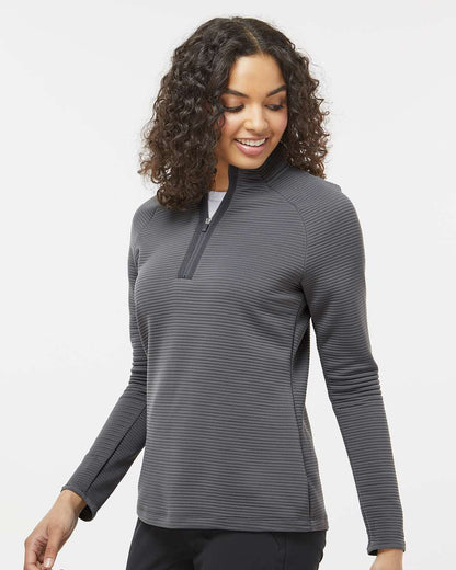 Woman wearing a gray long-sleeve shirt with a quarter zip on a white background, Adidas Women's Spacer Quarter-Zip Pullover, Embroidered by Helmsman Stitch Co.