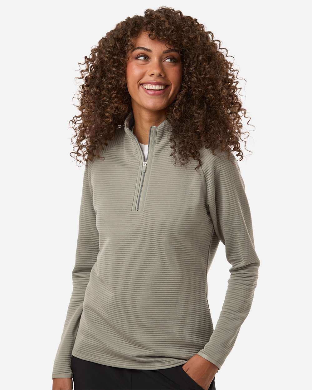 Woman wearing a light gray long-sleeve shirt with a quarter zip on a white background. Adidas Women's Spacer Quarter-Zip Pullover, Embroidered by Helmsman Stitch Co.