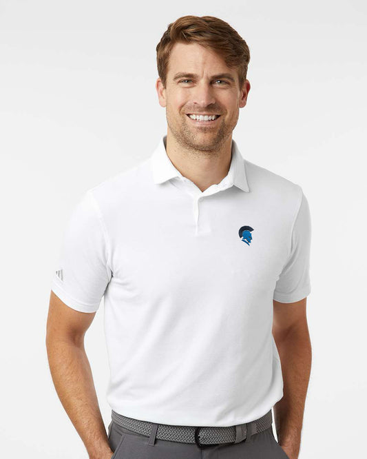 Man wearing a white polo shirt with a logo on a white background. Adidas Men's Blended Polo, Sparta Michigan Spartans logo by Helmsman Stitch Co.