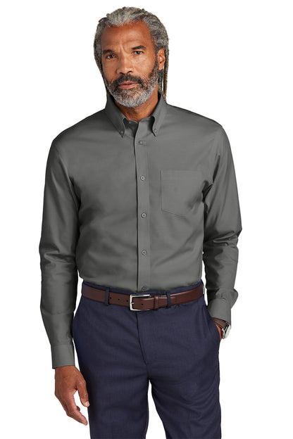Man wearing a gray dress shirt and navy pants on a white background embroidered Brooks Brothers® Wrinkle-Free Stretch Pinpoint Shirts