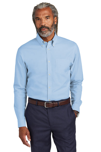 Man wearing a light blue button-up shirt and dark blue pants on a white background embroidered Brooks Brothers® Wrinkle-Free Stretch Pinpoint Shirts