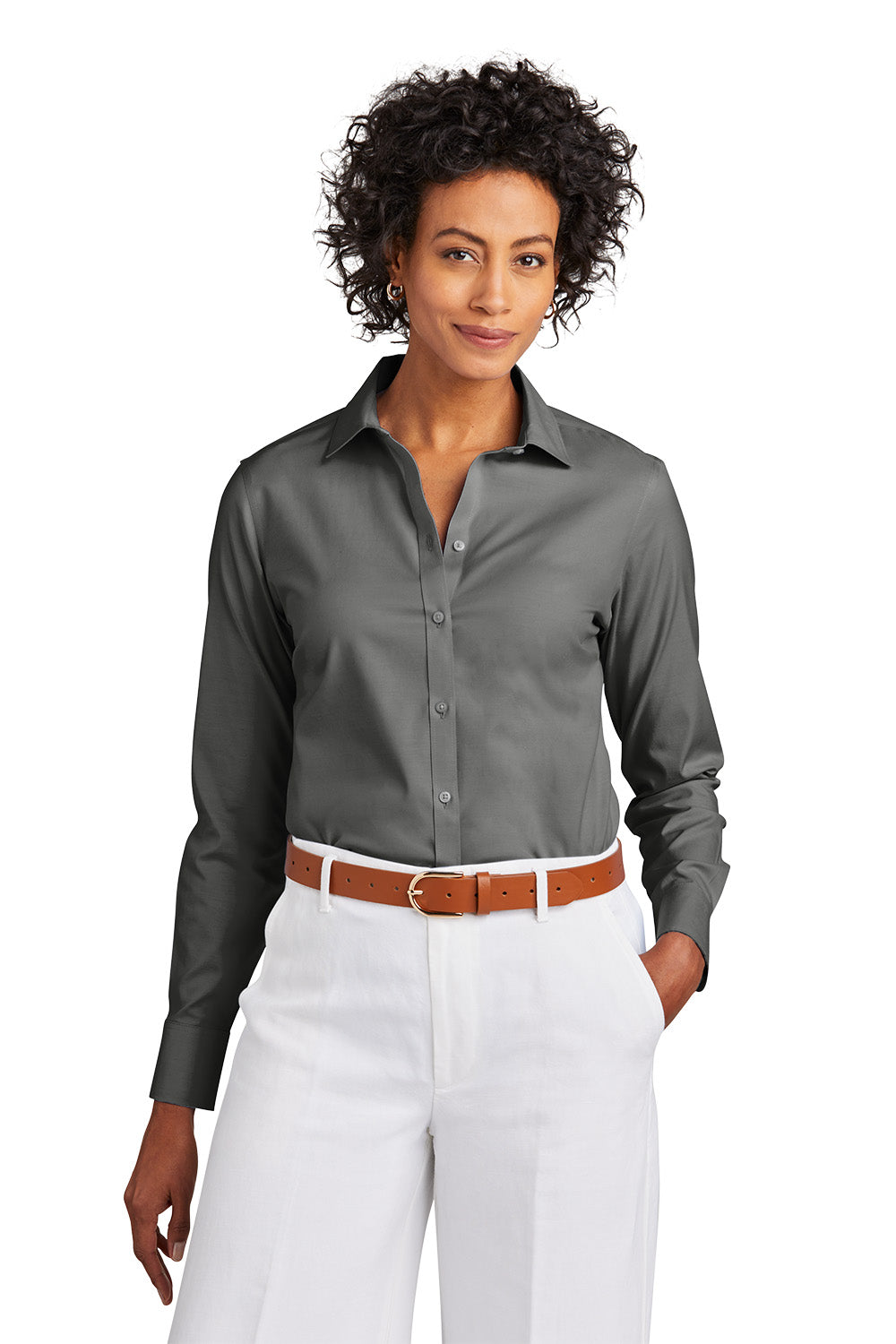 Woman wearing a gray button-up shirt and white pants with a brown belt on a white background embroidered Brooks Brothers® Women’s Wrinkle-Free Stretch Pinpoint Shirt