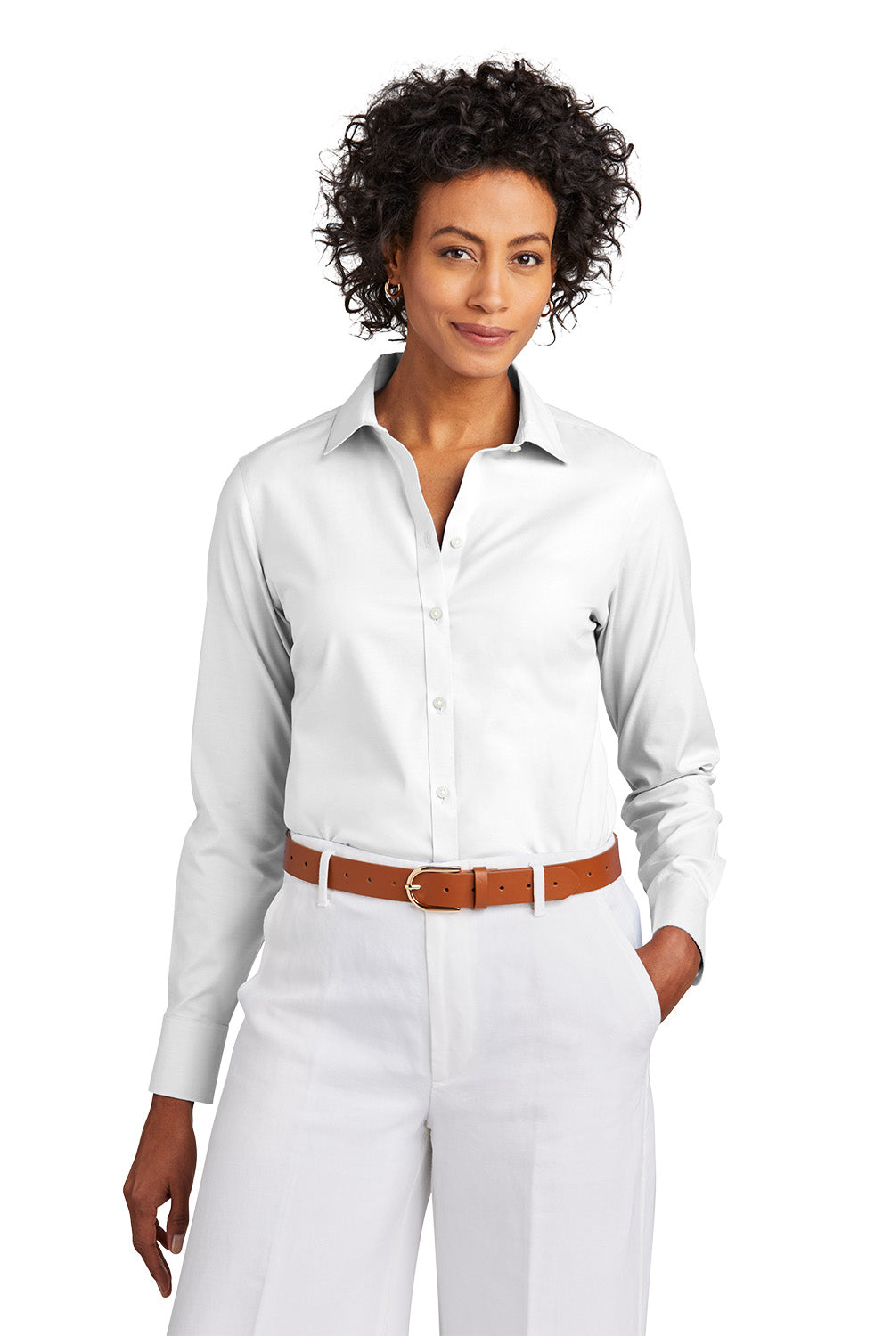Woman wearing a white shirt and white pants with a brown belt on a white background embroidered Brooks Brothers® Women’s Wrinkle-Free Stretch Pinpoint Shirt