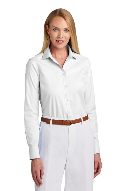 Woman wearing a white dress shirt and white pants with a brown belt on a white background embroidered Brooks Brothers® Women’s Wrinkle-Free Stretch Pinpoint Shirt