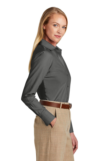 Woman wearing a gray shirt and beige pants on a white background embroidered Brooks Brothers® Women’s Wrinkle-Free Stretch Nailhead Shirt