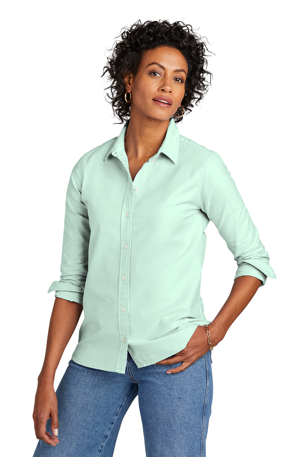 Woman wearing a light green shirt and blue jeans on a white background embroidered Brooks Brothers® Women’s Casual Oxford Cloth Shirt