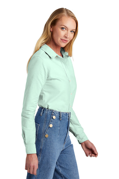Woman wearing a light green shirt and blue jeans on a white background embroidered Brooks Brothers® Women’s Casual Oxford Cloth Shirt