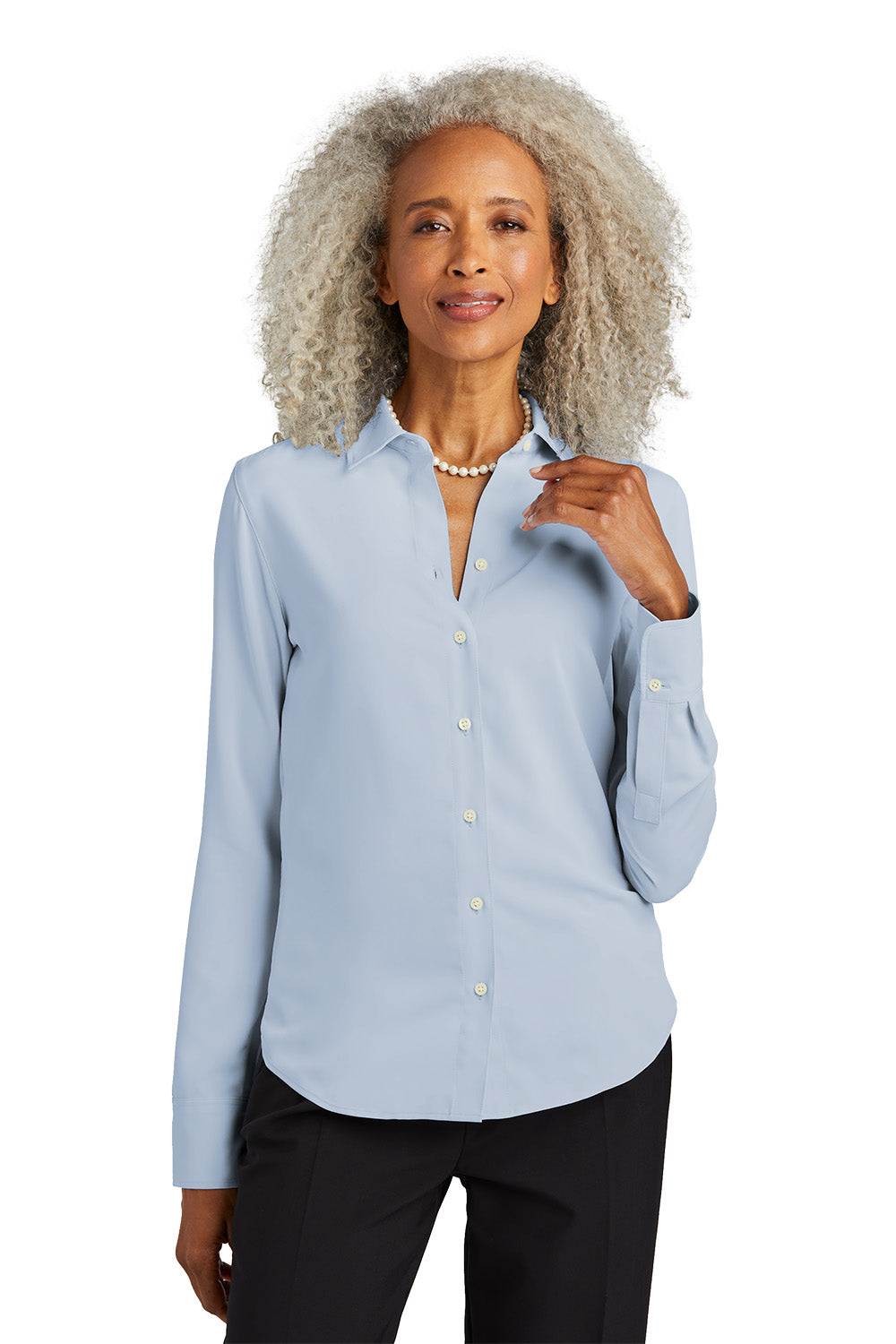Woman wearing a light blue button-up shirt on a white background embroidered Brooks Brothers® Women’s Full-Button Satin Blouse