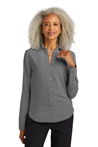 Woman wearing a gray button-up shirt on a white background embroidered Brooks Brothers® Women’s Full-Button Satin Blouse