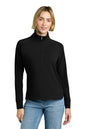 Woman wearing a black quarter-zip pullover and blue jeans on a white background, Brooks Brothers® Women's Luxe Performance 1/4-Zip, Embroidered