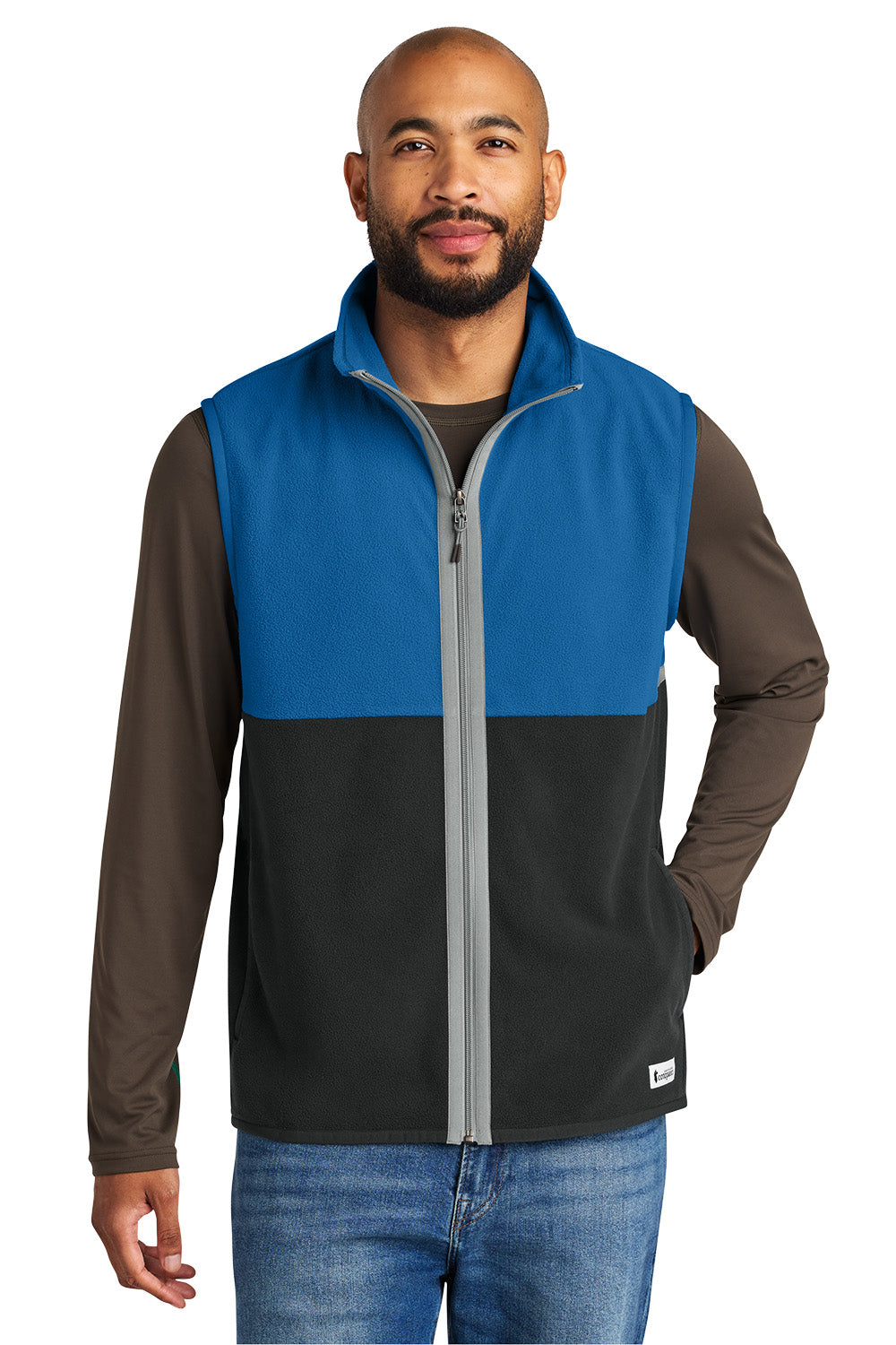 Man wearing a blue and black two-tone vest on a white background, Embroidered Cotopaxi® Amado Fleece Vest