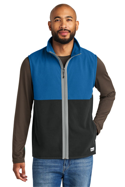 Man wearing a blue and black two-tone vest on a white background, Embroidered Cotopaxi® Amado Fleece Vest