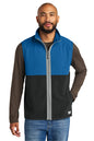 Man wearing a blue and black two-tone vest on a white background, Embroidered Cotopaxi® Amado Fleece Vest
