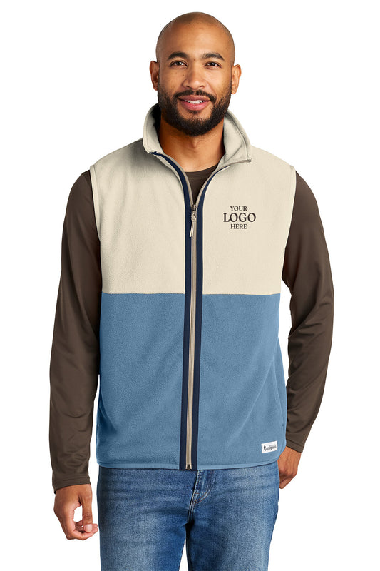 Man wearing a two-tone jacket with customizable logo area on a white background, Embroidered Cotopaxi® Amado Fleece Vest