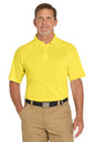 Man wearing a yellow polo shirt and beige pants on a white background. Embroidered CornerStone® Select Snag-Proof Tactical Polo