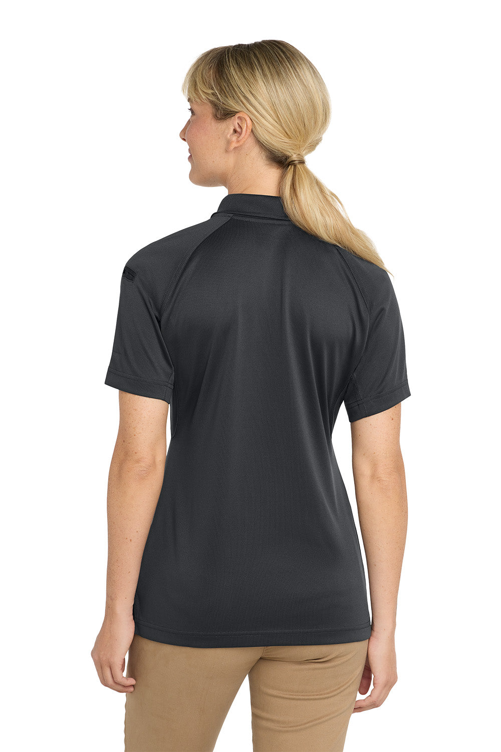 Woman wearing a black short-sleeve shirt on a white background, CornerStone® Women's Select Snag-Proof Tactical Polo