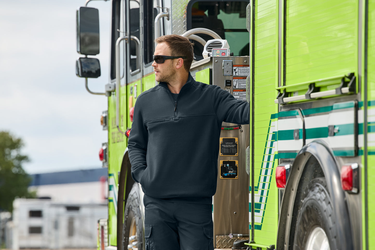 Man standing next to a green fire truck, CornerStone® 12-Oz. Tough Fleece Job Shirt, Embroidered