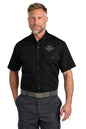 Man wearing a black short-sleeve work shirt with customizable logo area on a white background emroidered CornerStone® Short Sleeve Select Ripstop Shirt