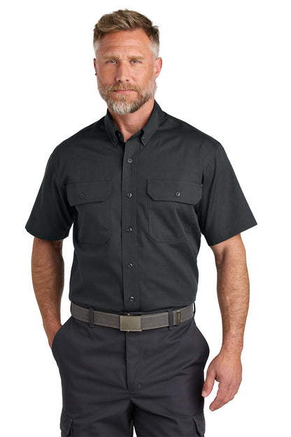 Man wearing a black short-sleeve shirt with two front pockets on a white background emroidered CornerStone® Short Sleeve Select Ripstop Shirt