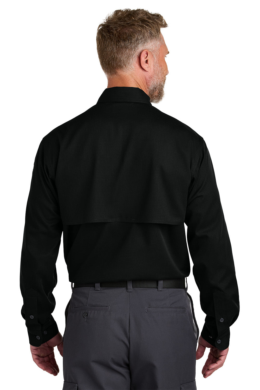 Man wearing a black long-sleeve shirt and gray pants on a white background embroidered CornerStone® Long Sleeve Select Tactical Shirt