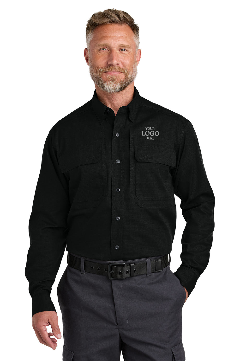 Man wearing a black shirt with a logo on a white background embroidered CornerStone® Long Sleeve Select Tactical Shirt
