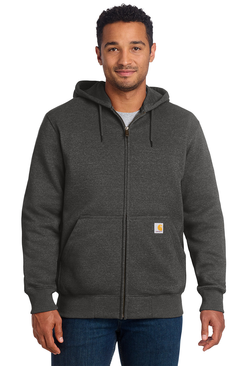 Man wearing a gray hoodie with a visible brand logo on a white background, embroidered Carhartt® Rain Defender® Paxton Heavyweight Hooded Zip-Front Sweatshirt