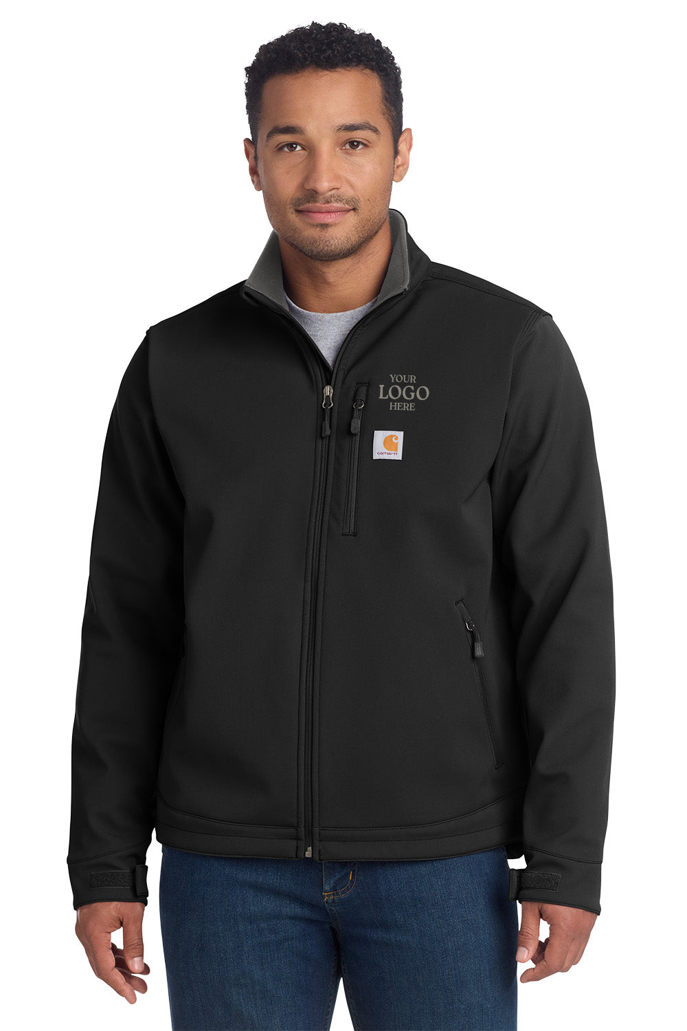 Man wearing a black jacket with a logo patch on a white background embroidered Carhartt® Crowley Soft Shell Jacket