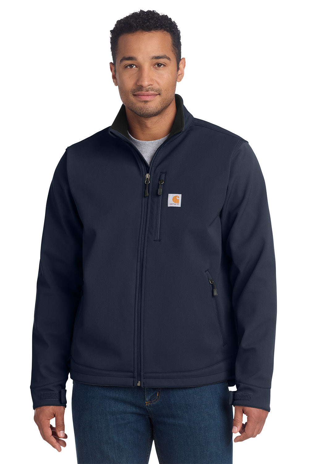 Man wearing a navy blue jacket with a visible brand logo on a white background embroidered Carhartt® Crowley Soft Shell Jacket
