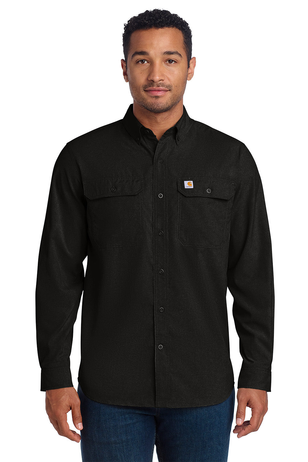 Man wearing a black Carhartt long-sleeve shirt on a white background embroidered Carhartt Force® Solid Long Sleeve Shirt