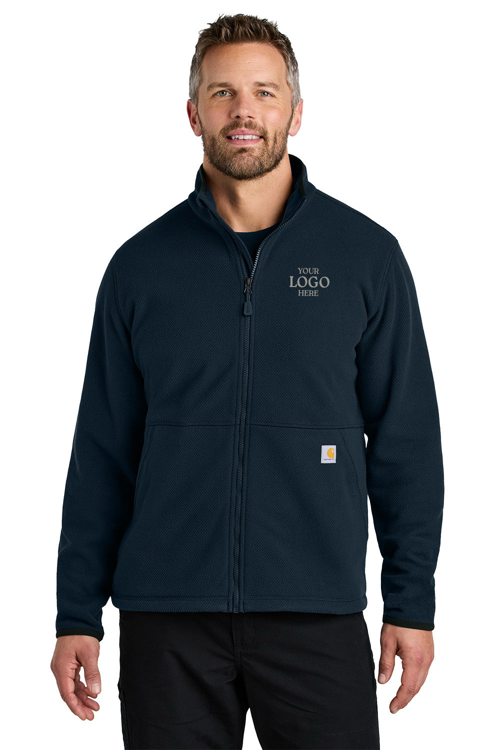 Man wearing a navy blue jacket with a customizable logo area on a white background embroidered Carhartt® Textured Full-Zip Fleece Jacket