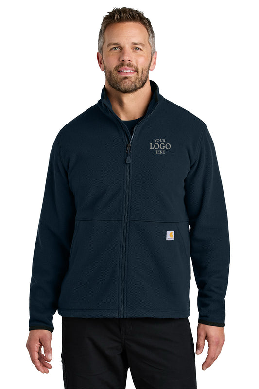 Man wearing a navy blue jacket with a customizable logo area on a white background embroidered Carhartt® Textured Full-Zip Fleece Jacket