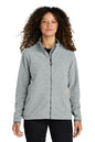 Woman wearing a gray fleece jacket on a white background  embroidered Carhartt® Women’s Textured Full-Zip Fleece Jacket