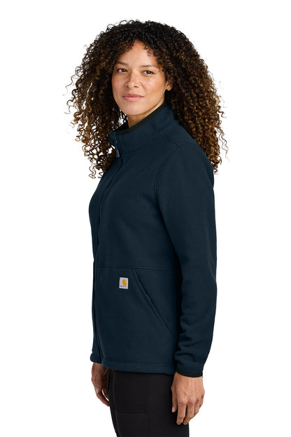 Woman wearing a navy blue Carhartt jacket on a white background  embroidered Carhartt® Women’s Textured Full-Zip Fleece Jacket